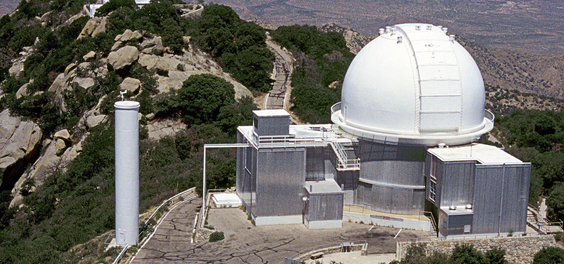 The 0.9-meter Coudé Feed Telescope consists of a 0.9 m alt-azimuth three-mirror telescope with a dedicated spectrograph system.