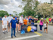 Staff participants at the start of the Merrie Monarch parade route