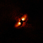 Dusty disk around HD 145718