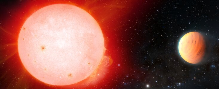 Artist impression of ultra fluffy gas giant planet orbiting a red dwarf star