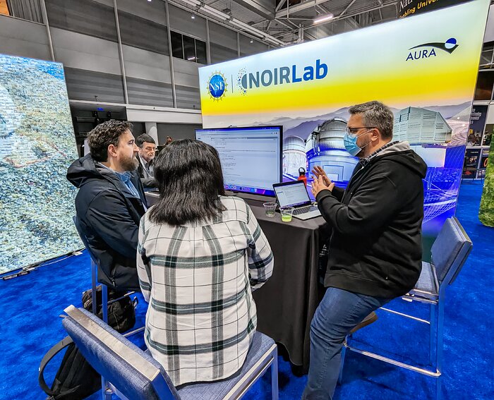 Robert Nikutta at the AAS 243 booth