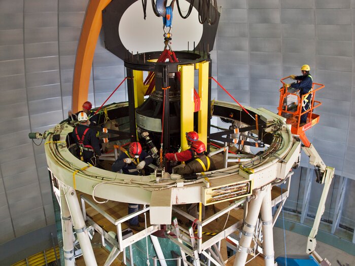 The DECam prime focus cage is mounted in the top ring of the Blanco 4-m telescope