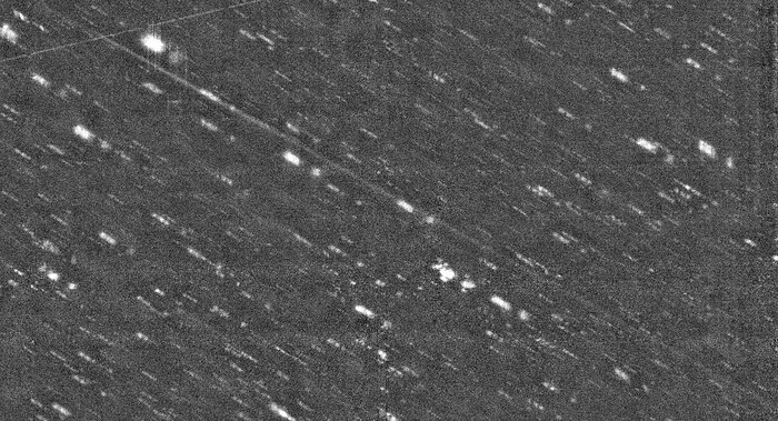 New Camera at WIYN images an Asteroid with a Long Tail