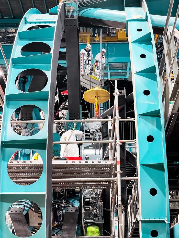 Rubin Observatory's secondary mirror is installed onto the telescope